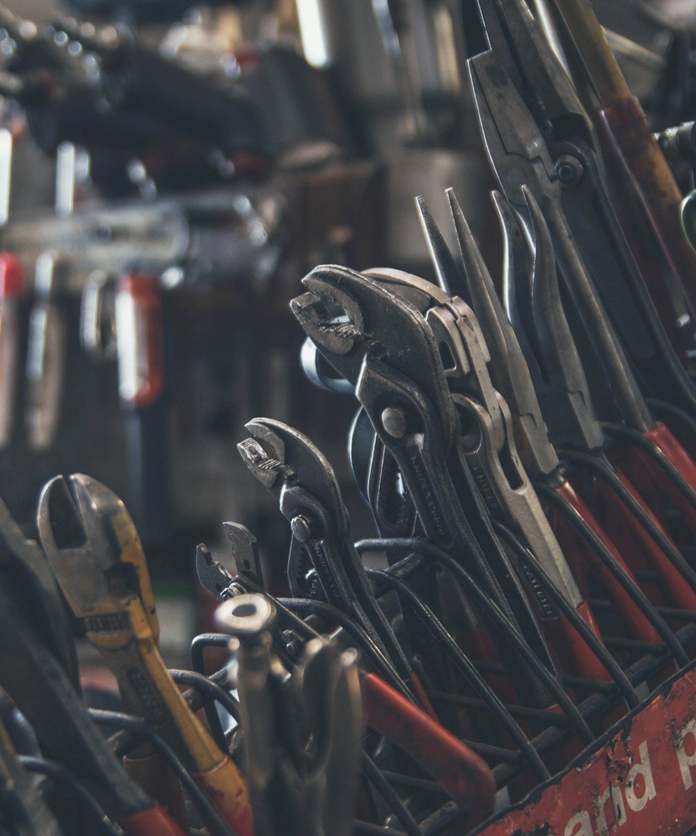 Plumbing Alliance master plumbers' tool tray — wrenches, pliers, and trade equipment used on every Toronto service call